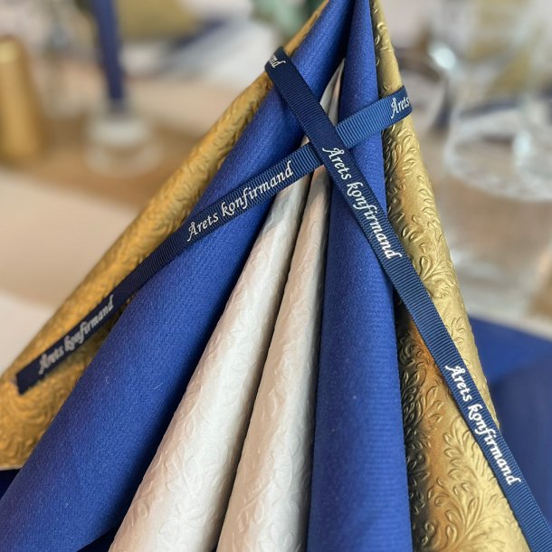 �rets konfirmandb�nd m�rkebl� med s�lvtryk 20 meter